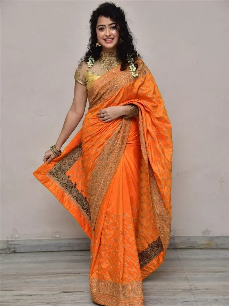 Actress Apsara Rani in Orange Saree at Talakona Movie Launch